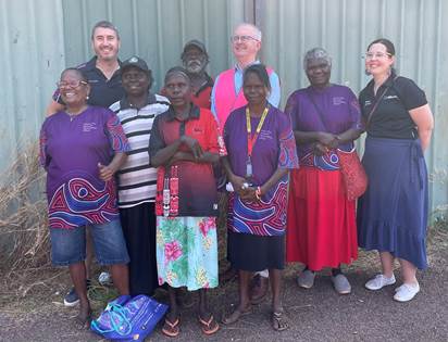 Image:  Electoral Commissioner Tom Rogers, members of the AEC’s Indigenous Electoral Participation  Program, AEC Community Engagement Officers and members of the Wurrumiyanga  community on 26 September 2023.